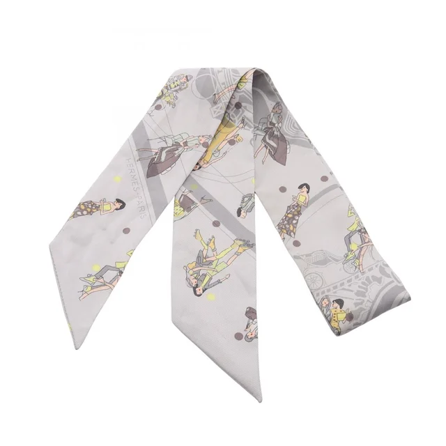 Hermès Scarf Twilly Ex Libris les Parisienne Ribbon Gray Silk in Grey Silk from The Reluxe