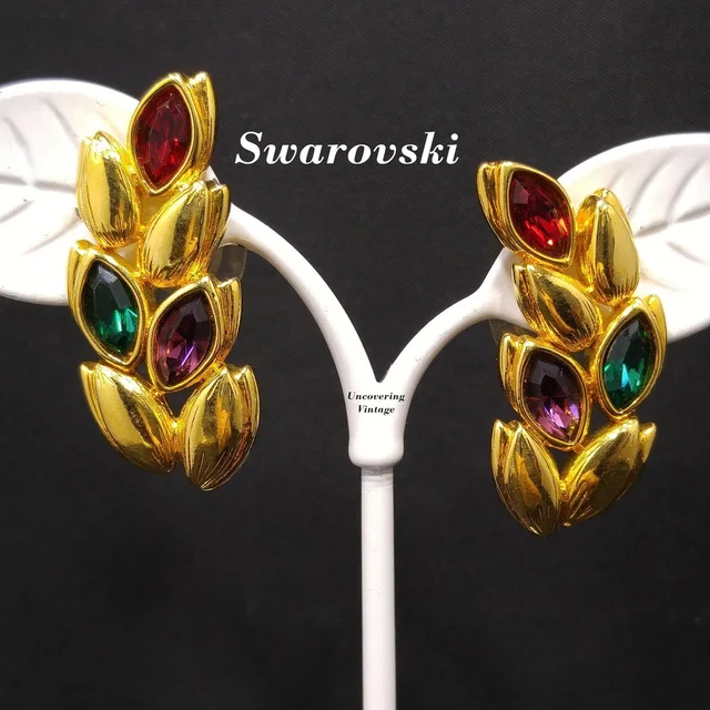Swarovski Vintage Leaf Earrings, Gold Plated Red Green Purple Rhinestones, 1990s in gold from Poshmark