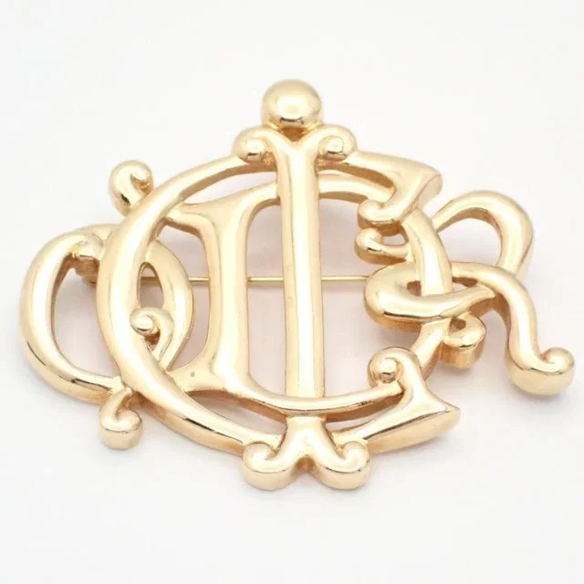 Dior Brooch Emblem Logo Bag from The Reluxe