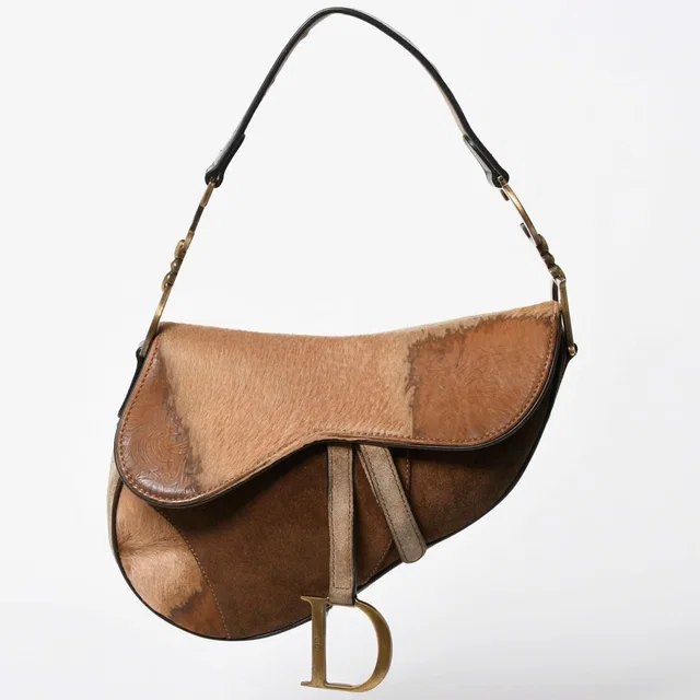 Dior Saddle Bag Calf Hair Suede Brown Gold in Brown Suede from The Reluxe