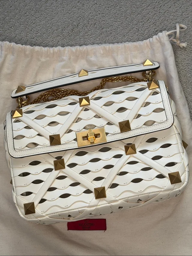 Valentino Garavani Large Rockstud Shoulder Bag in gold|white from Poshmark