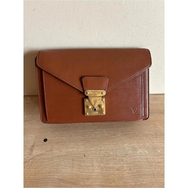 Louis Vuitton Women's Brown Bag in brown|red Leather from Poshmark, photo 1 of 1