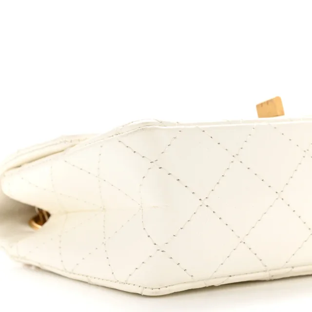 Chanel Aged Calfskin Quilted 2.55 Reissue Mini Flap White in White Calfskin from FASHIONPHILE, photo 9 of 14