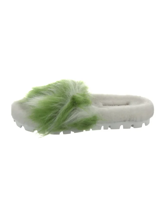 Miu Miu Fur Slides in green from The RealReal