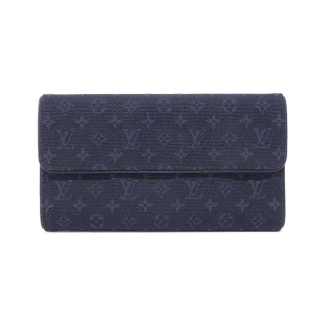 Louis Vuitton Monogram Mini Portefeuille International Wallet in Canvas from The Reluxe