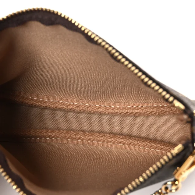 Louis Vuitton Monogram Trunks and Locks Mini Pochette Accessories in Canvas from FASHIONPHILE, photo 5 of 7
