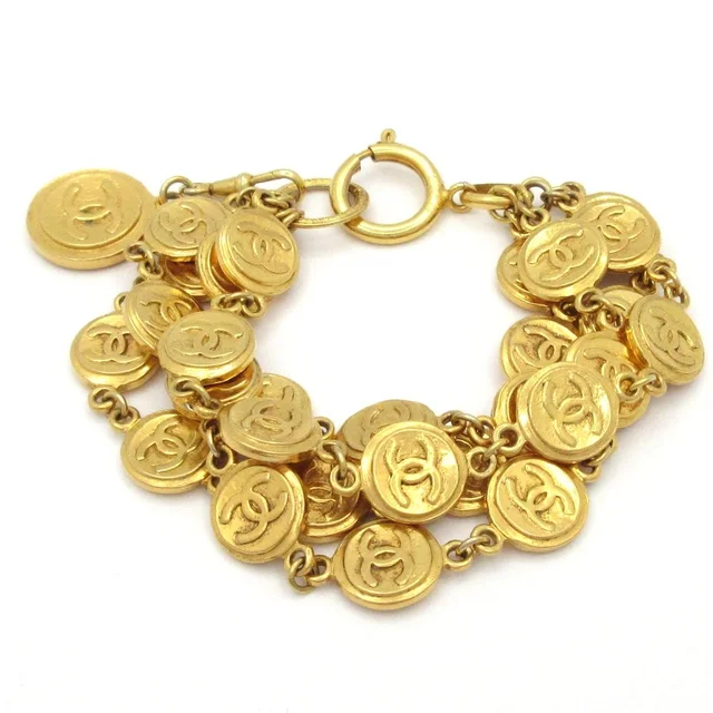 Chanel Bracelet CC Logo Gold Coin in Gold from The Reluxe