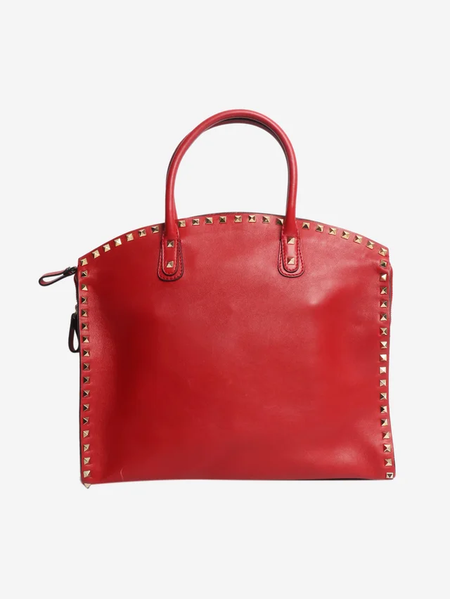 Valentino Garavani Red rockstud leather top handle bag in Red Leather from Sign of the Times