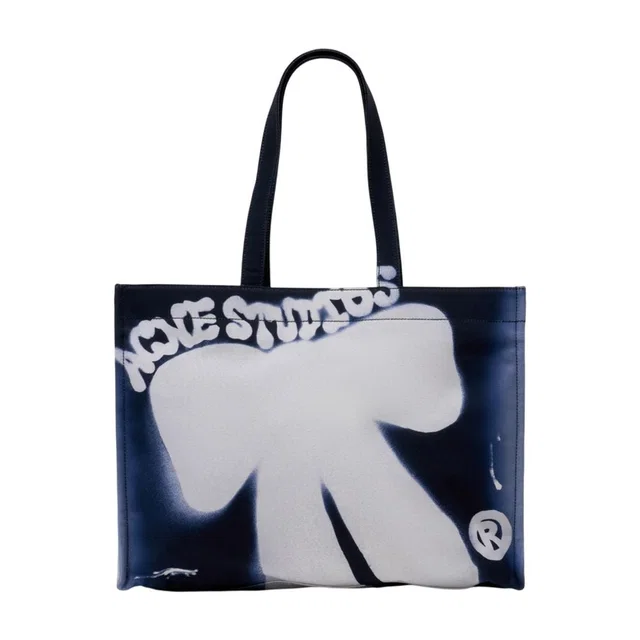Acne Studios Logo-Graphic Cotton Tote Bag — Blue in Blue Canvas from HEWI
