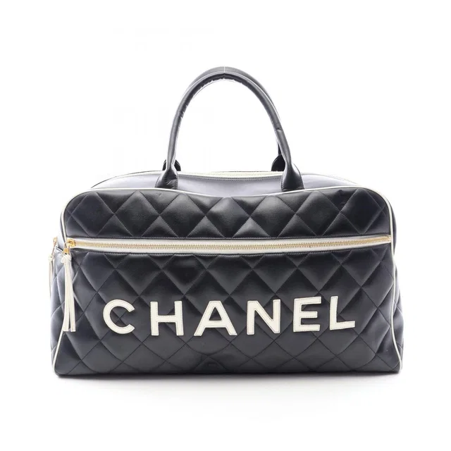 Chanel Boston Bag Quilted Logo Black Leather in Black Leather from The Reluxe