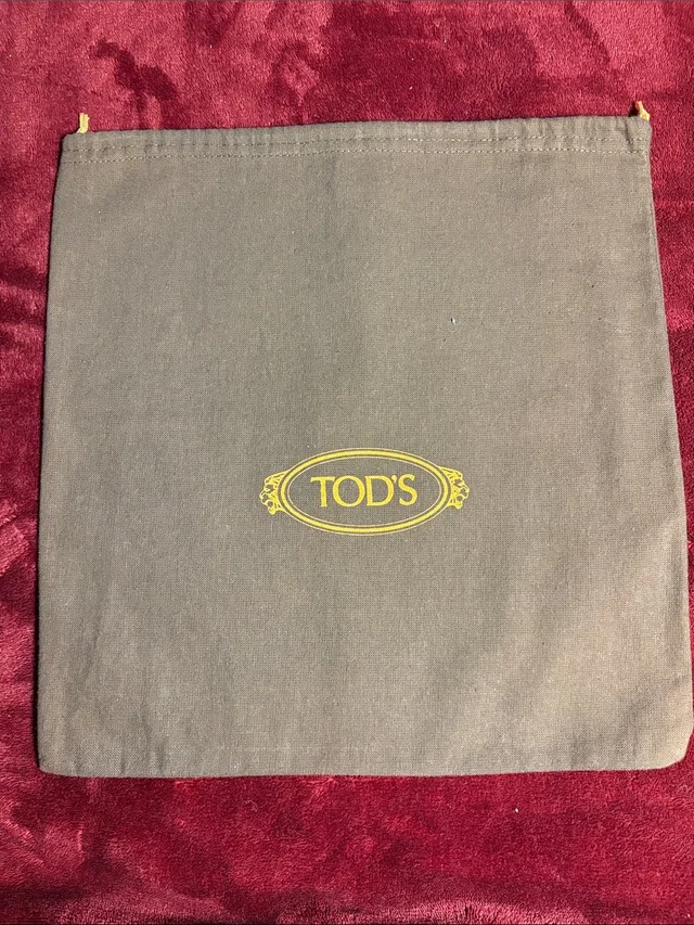 Tod's Brown Canvas Dust Bag With Yellow Logo in red|yellow|brown Canvas from Poshmark