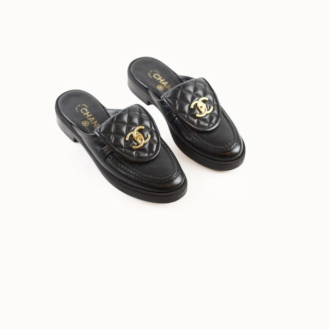 Chanel CC Turnlock Flat Mules size 36.5 in Leather from The Purse Affair