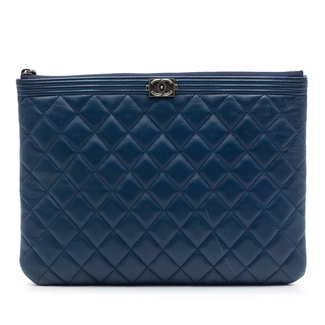 Blue Chanel Medium Quilted Lambskin Boy O Case Clutch in Blue Lambskin from Designer Revival