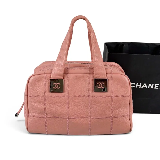 Chanel Choco Bar Bowling Bag Pink Caviar Leather in Pink Caviar leather from The Reluxe