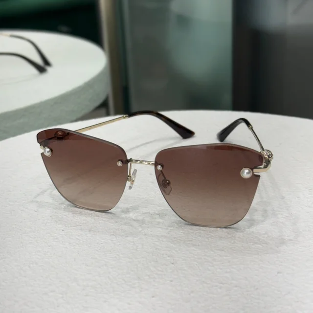 Jimmy Choo Sunglasses - Gold in Gold from Revivre Luxury Consignment