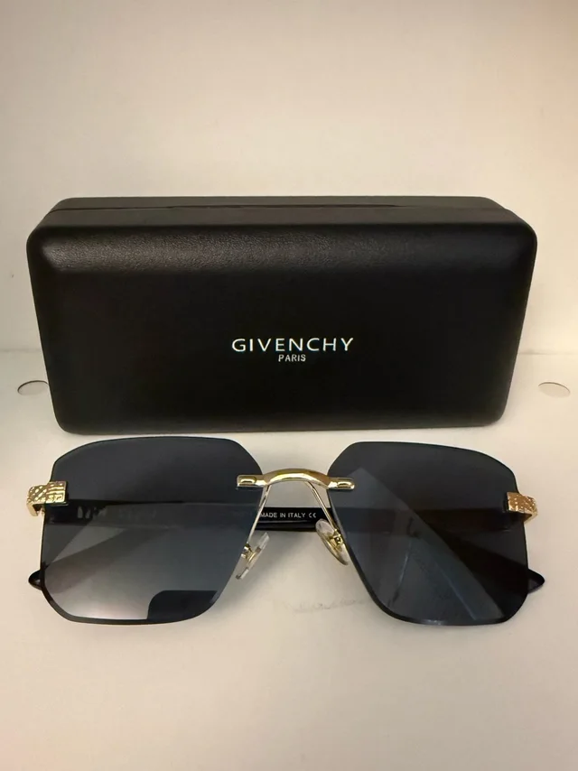 Givenchy Rimless Sunglasses in black|gold from Poshmark