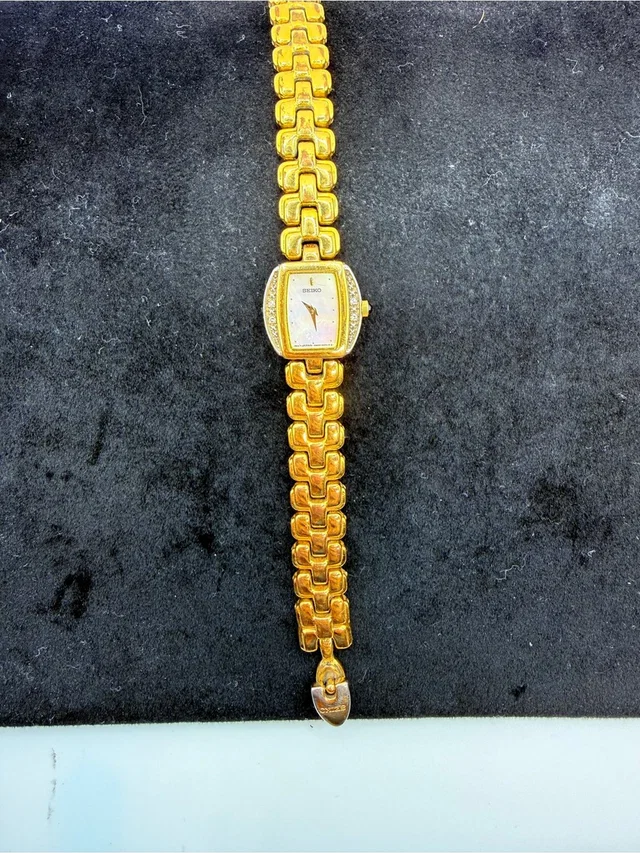 Seiko Vintage 4n00-6809 Mop Diamond Gold Tone Ladies Quartz Watch 6.5” in gold from Poshmark