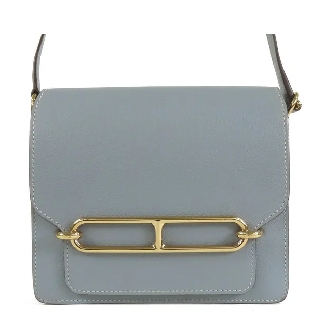 Hermès Roulis Mini Ciel Gold Evercolor Shoulder Bag in Gold from The Reluxe