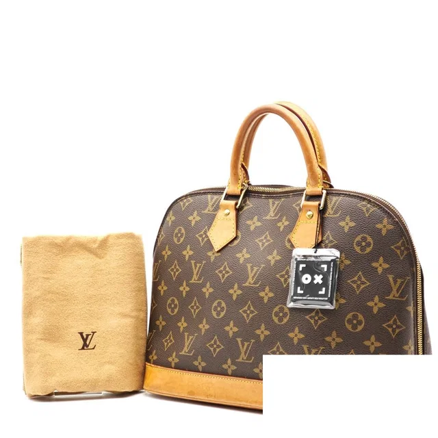 Louis Vuitton Alma PM Monogram Canvas Brown Handbag in Brown Coated canvas from The Reluxe