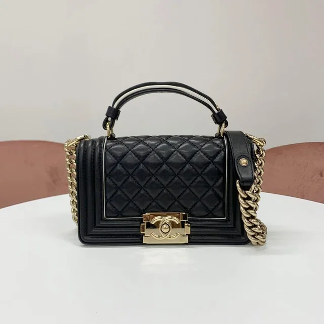 Chanel Boy 20 Quilted Lambskin Gunmetal Shoulder Bag in Lambskin from The Reluxe