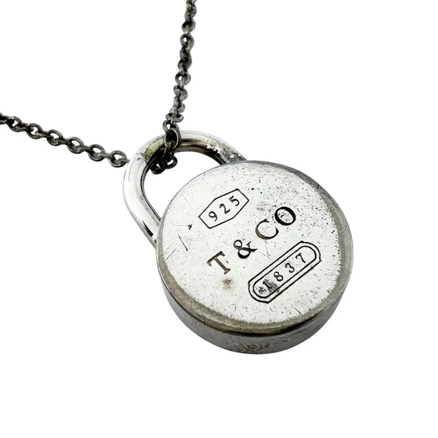 Tiffany & Co. 1837 Necklace Round Lock Silver in Silver from The Reluxe