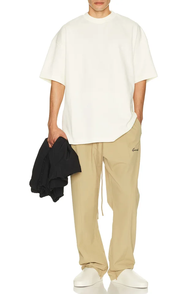 Fear of God ESSENTIALS Signature Track Pant in Dune, photo 4 of 6 from REVOLVE (Canada)