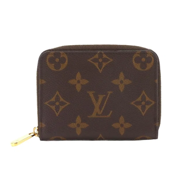 Louis Vuitton Monogram Zippy Coin Purse Brown in Brown Coated canvas from The Reluxe