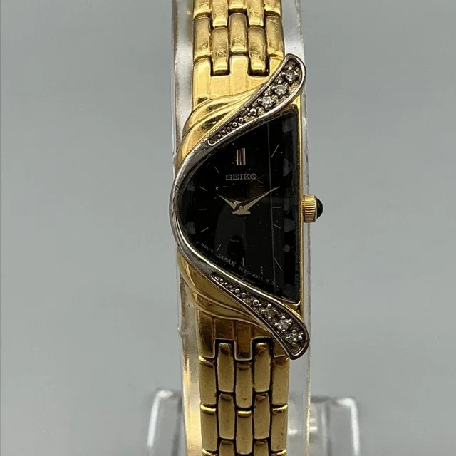 Seiko Womens Watch 14mm Black Dial Gold Tone Gemmed 2e20-7309 New Battery 7.5" in black|gold from Poshmark