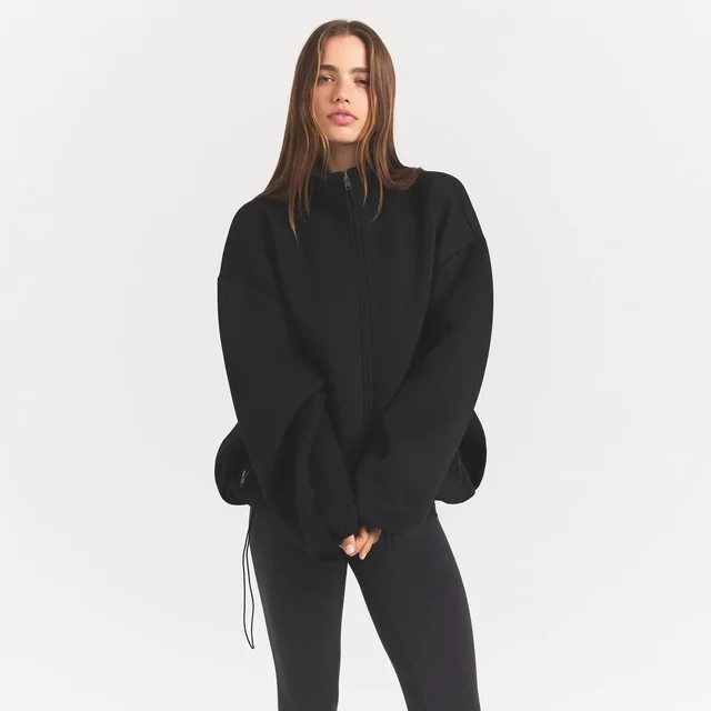 SKIMS neoprene outerwear oversized mock neck jacket, photo 4 of 4 from SKIMS