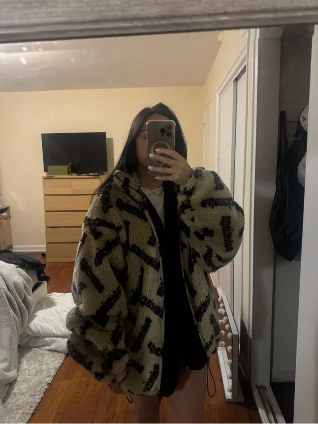 Balenciaga All-Over Logo Faux Fur Jacket in black|brown|neutral from Poshmark