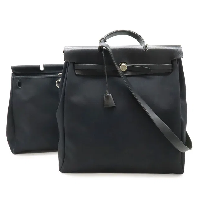 Hermès Herbag MM 2-Way Shoulder Bag Toile Officier Leather Black Silver in Black Leather from The Reluxe