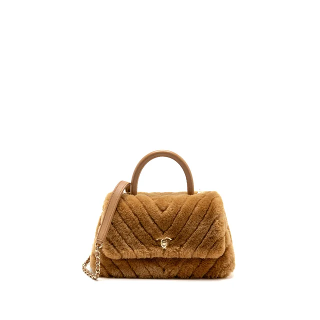 Chanel Small Chevron Coco Handle Bag Shearling Dark Beige LGHW in Beige Leather from EMIER