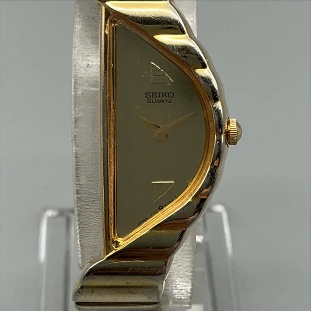 Vtg Seiko Womens Watch 14mm Gold Tone 1f20-5d59 Asymmetrical New Battery 5.75" in gold from Poshmark