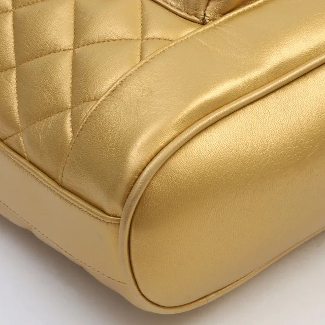 Chanel Circa 1992 Circle CC Turn-lock Backpack, Gold in Gold Lambskin from VINTAGE QOO TOKYO, photo 9 of 12