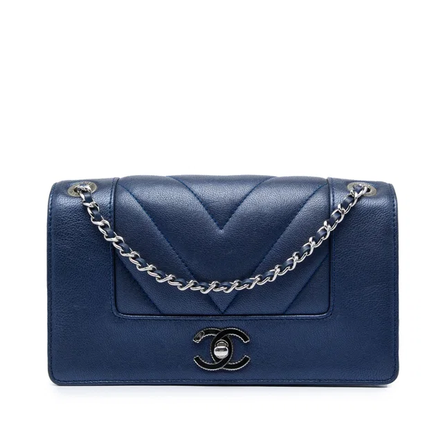Chanel Medium Chevron Metallic Sheepskin Vintage Mademoiselle Flap Crossbody Bag in Blue Leather from Designer Revival