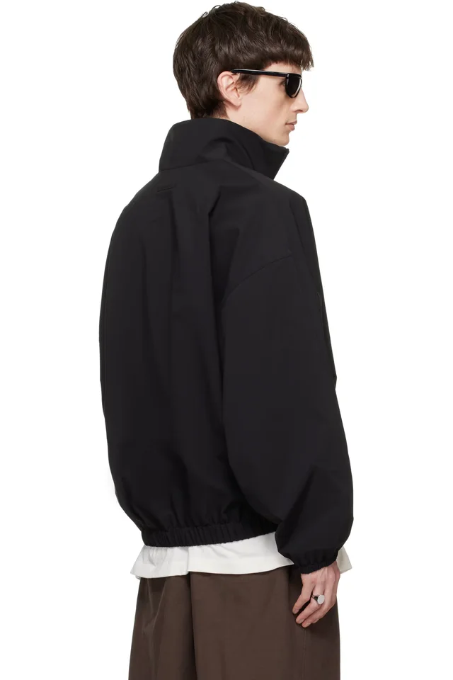 Fear of God ESSENTIALS Black Active Trace Half Zip Track Jacket, photo 3 of 4 from SSENSE