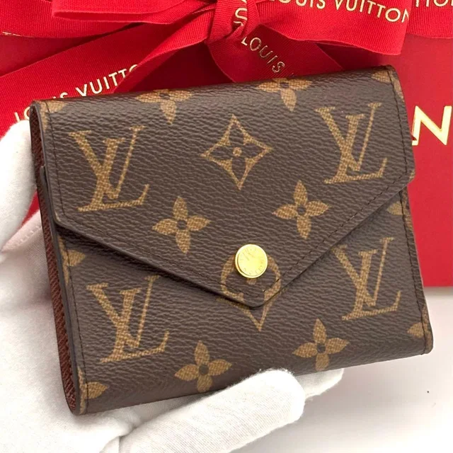 Louis Vuitton Wallet Monogram Portefeuille Victorine Brown in Brown from The Reluxe