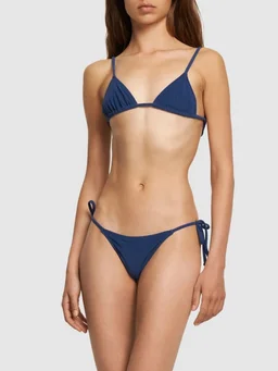 Tropic Of C Low-rise bikini bottoms with side knot in 85% Polyamide, 15% Elastane, photo 2 of 5 from LUISAVIAROMA