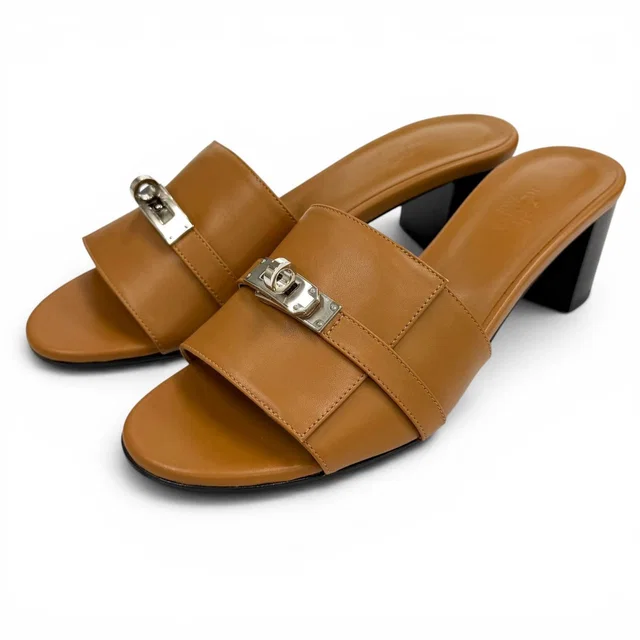 Hermès Gigi Natural Kelly Chunky Heel Leather Sandals in Beige Leather from The Reluxe