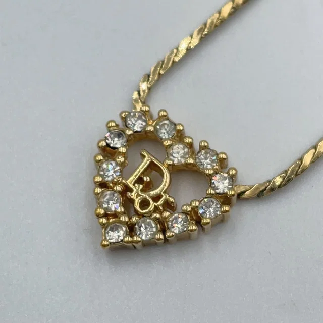 Dior Rhinestone Heart CD Logo Color Stone Clear Gold Necklace in Gold from The Reluxe