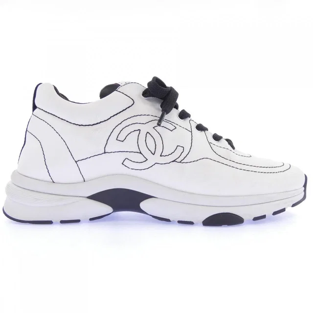Chanel Sneakers White in White from The Reluxe