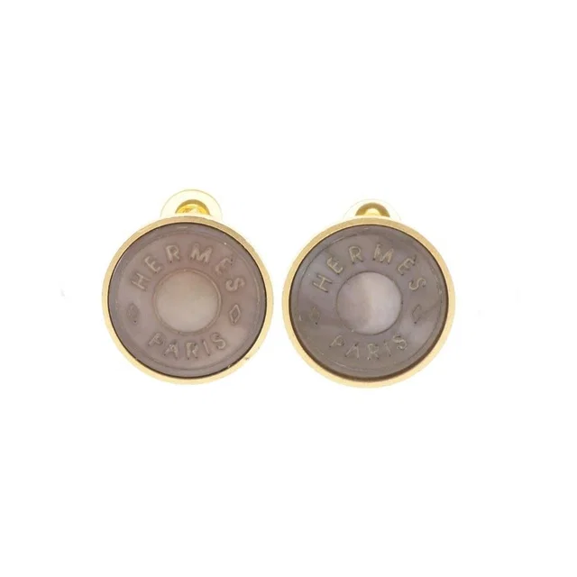 Hermès Sellier Gold Plated Shell Earrings in Gold from The Reluxe