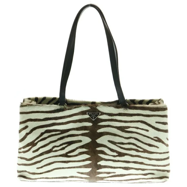 Prada Zebra Handbag Brown White Ponytail Leather in brown|white|red Leather from Poshmark, photo 1 of 1