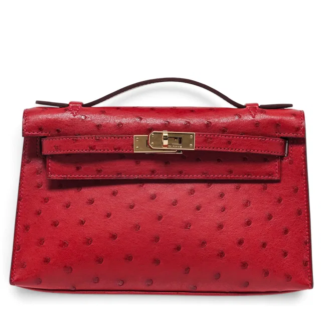 Hermès "Kelly Pochette\" Rouge Vif Ostrich in Red Ostrich from Liveauctioneers