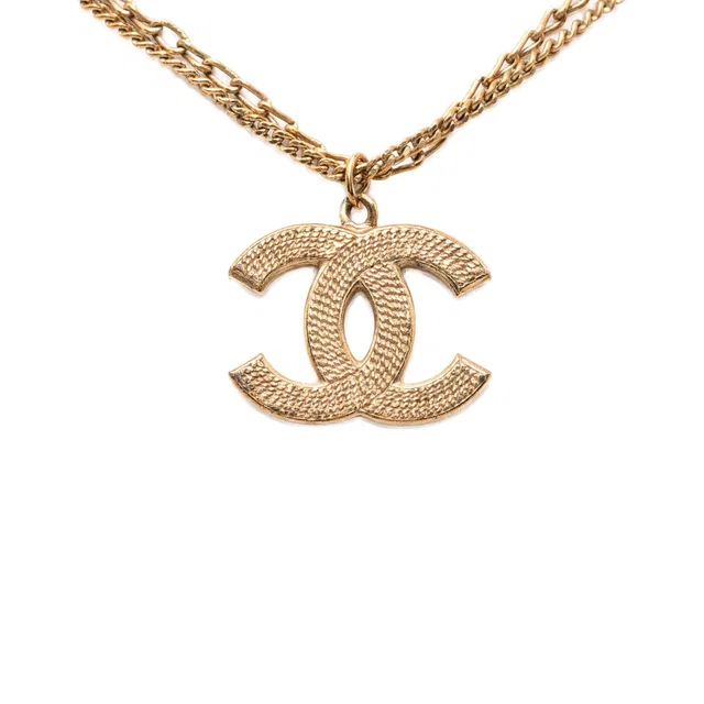 Gold Chanel CC Gold Plated Textured Pendant Double Chain Necklace in Gold from Designer Revival, photo 1 of 1