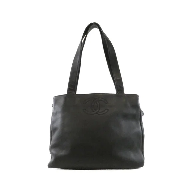Chanel Bag Handbag Black in Black Lambskin from The Reluxe