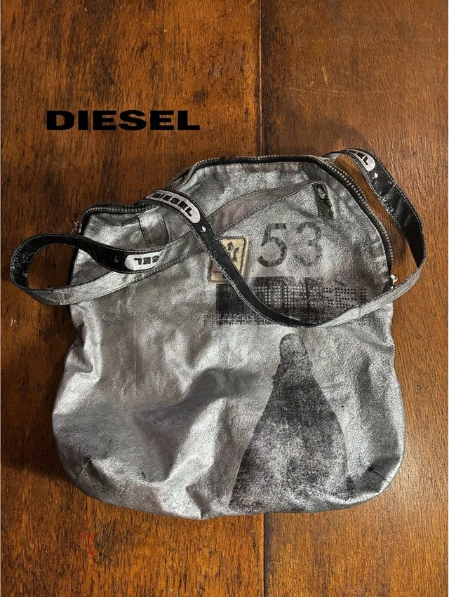 Diesel Project Liquid Space Experiment - Metalic Bag in black|gray Leather from Poshmark