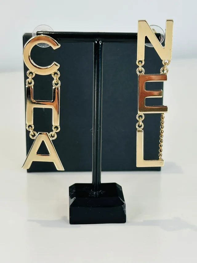 Chanel Gold Tone Letter Drop Earrings in Gold from Edit Second Hand