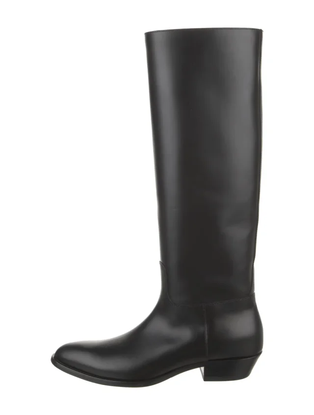 The Row Western Leather Riding Boots in black Leather from The RealReal