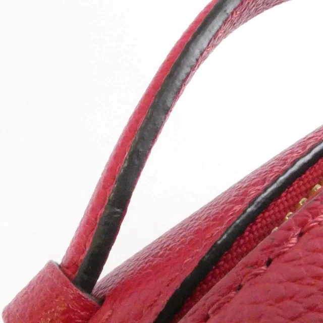 Louis Vuitton Saintonge Monogram Empreinte Shoulder Bag in Red Calfskin from LuxUness, photo 7 of 8